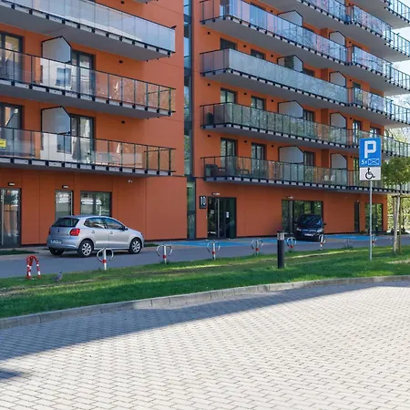 Family With A Sandbox On The Balcony In By Renters Kołobrzeg